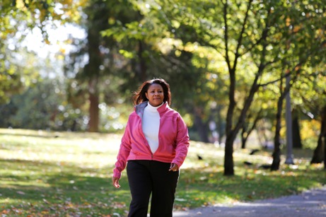 Woman walking through the park