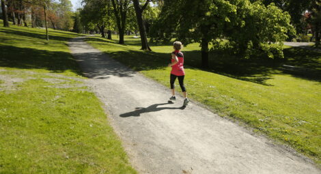 Woman running on a trail