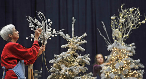 Woman decorating tree