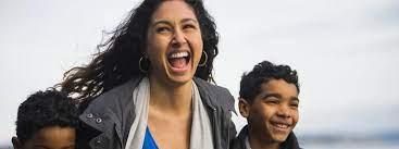 Mother laughing with child