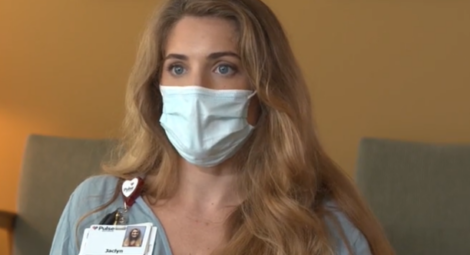Health care worker wearing a mask