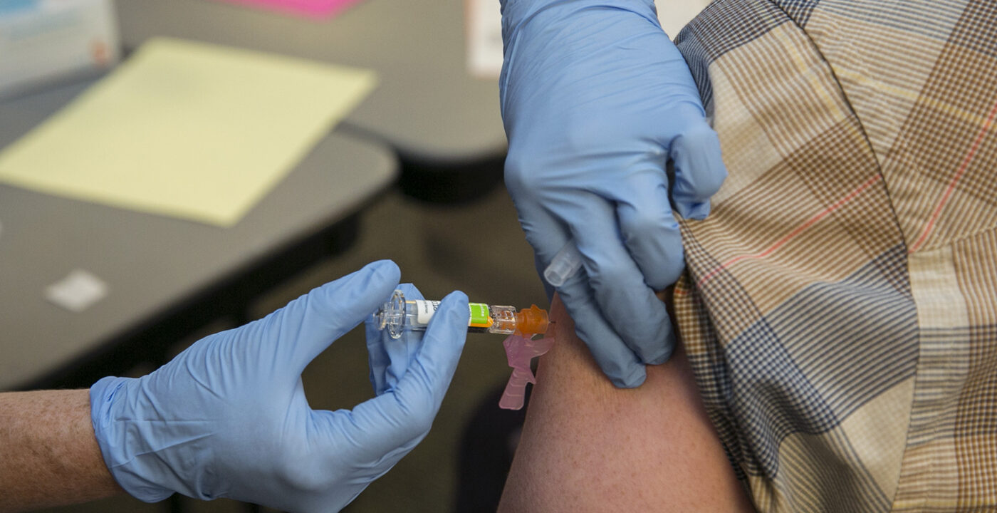 Person receiving flu vaccine