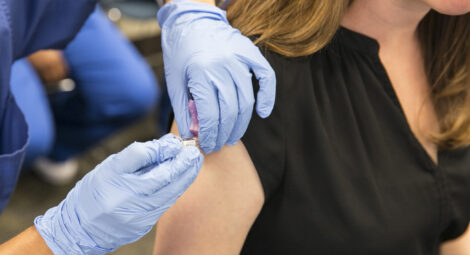 Woman getting a flu shot.
