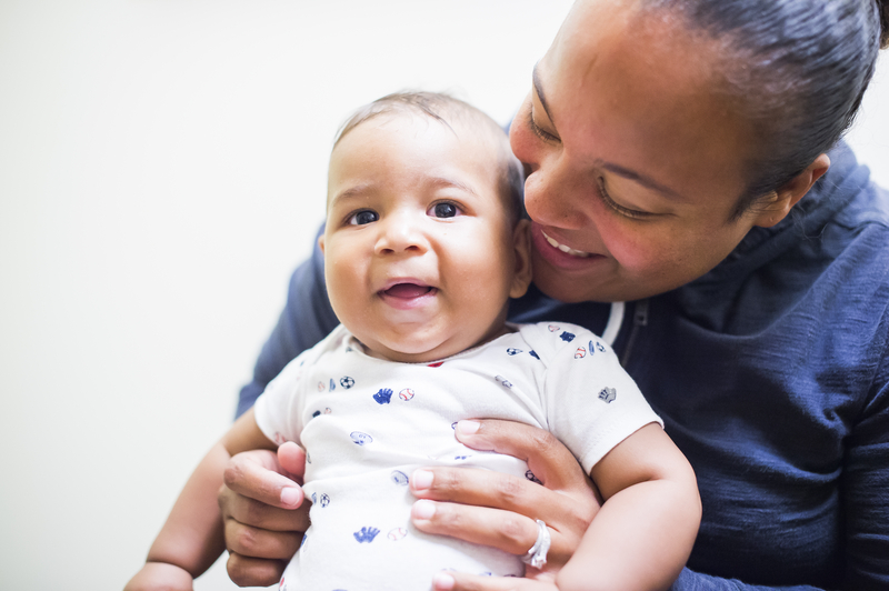 Mom and baby laughing