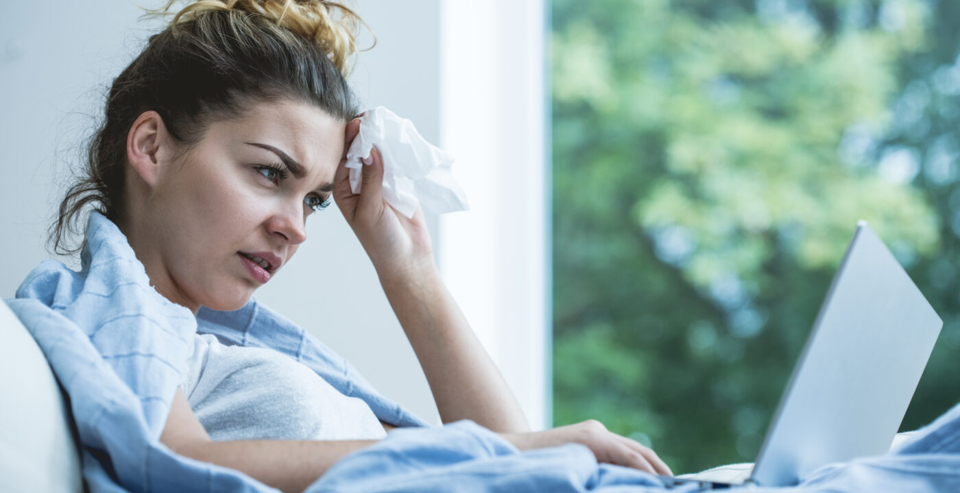 Woman with box of tissues