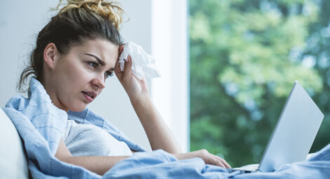 Woman with box of tissues