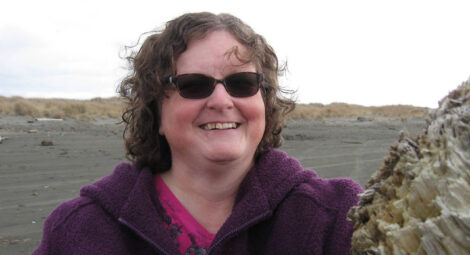 Woman in sunglasses smiling