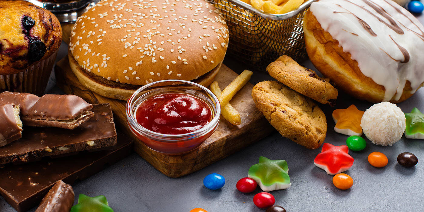 Table full of fast food and candy