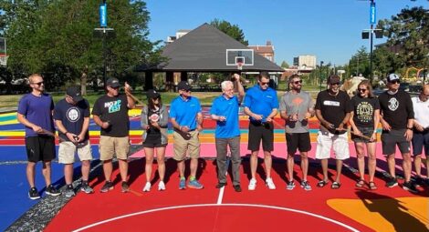 MultiCare staff gathered on a basketball court