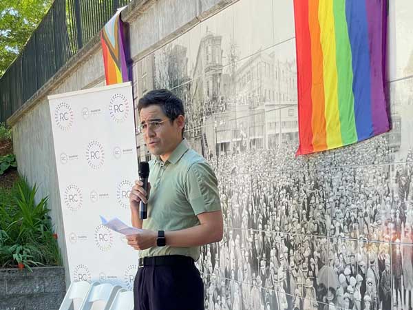 Person speaking to a crowd