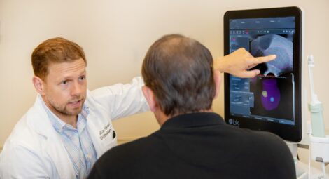 Doctor explaining chart to patient