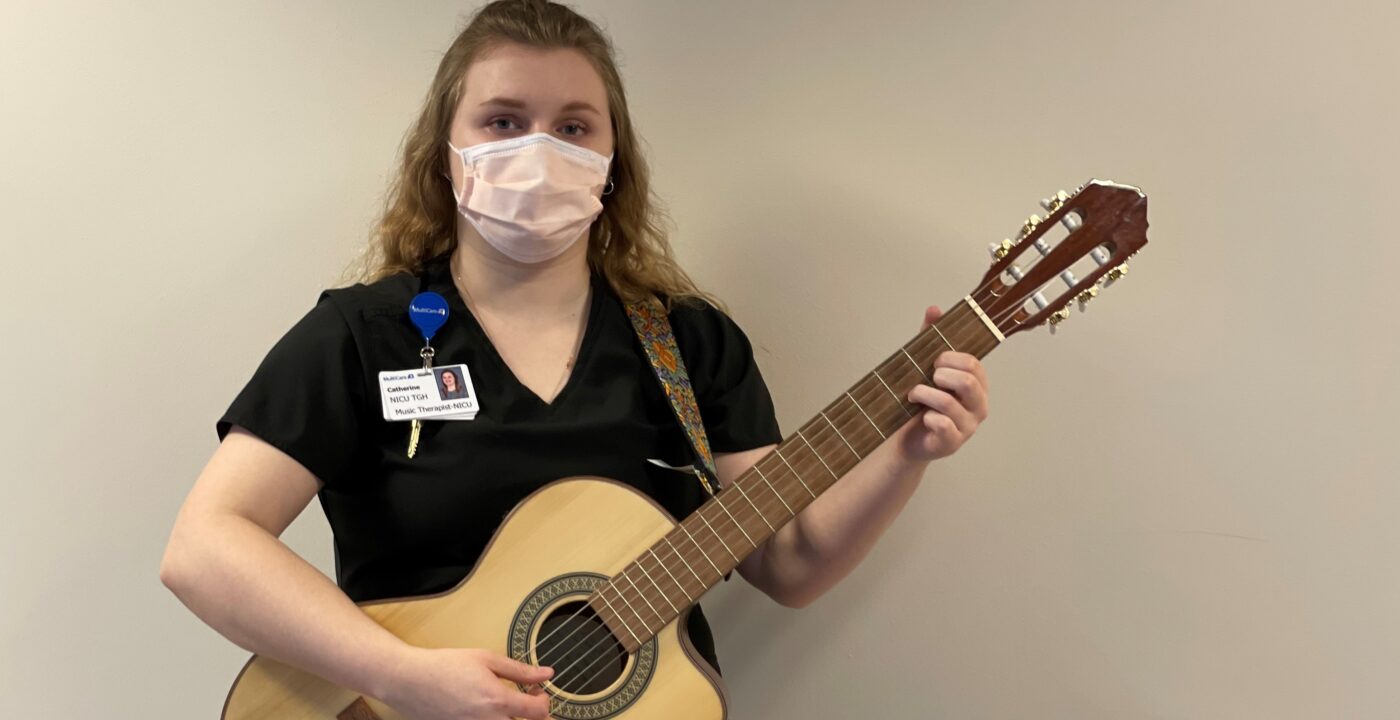 Nurse playing guitar