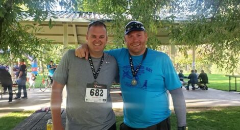 Two friends posing before a running race
