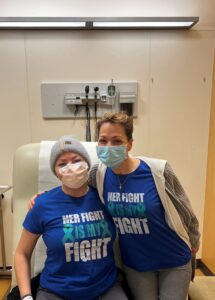 Two women in the hospital hugging.