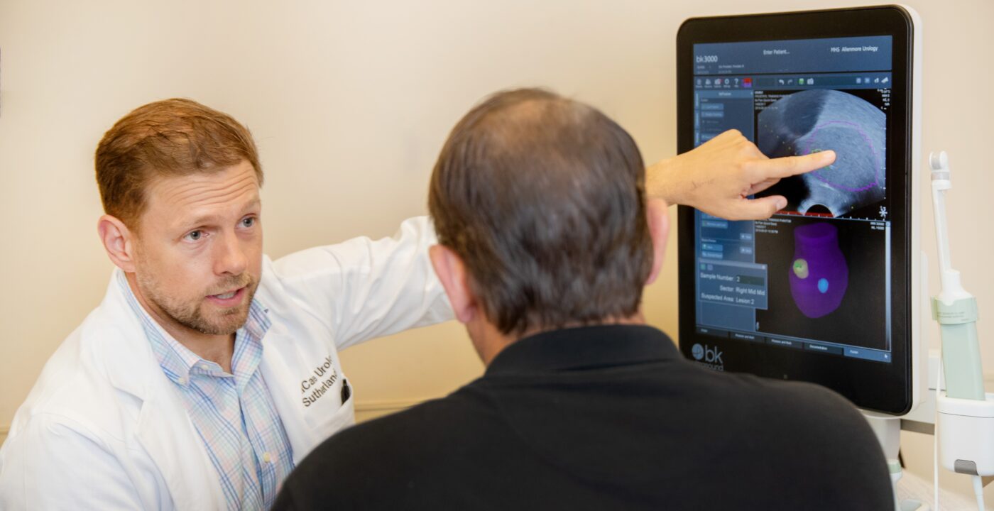 Doctor speaking with a male patient.