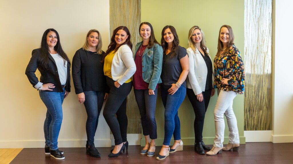 A group of women posing for a photo.