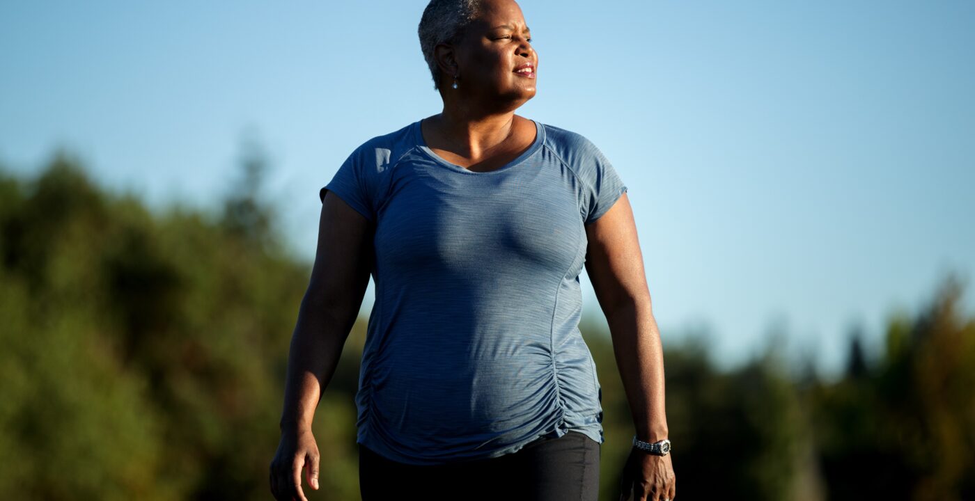 Woman outside on a walk.