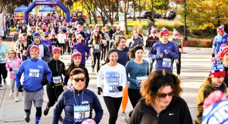Group of people running a race.