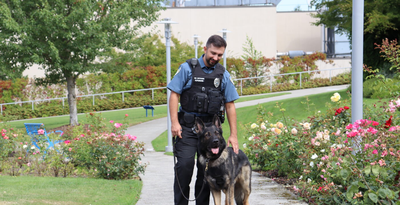 Security dog and his owner.
