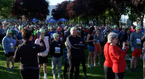 Group of runners and walkers gathered in park
