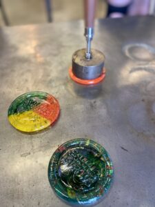 Multicolored glass medallions