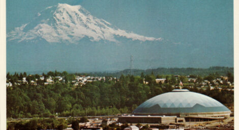 Historical photo of the Tacoma Dome with Mount Rainier in the background.