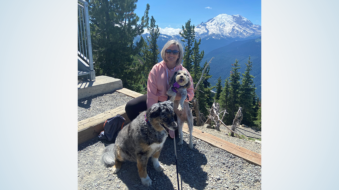 woman with two dogs