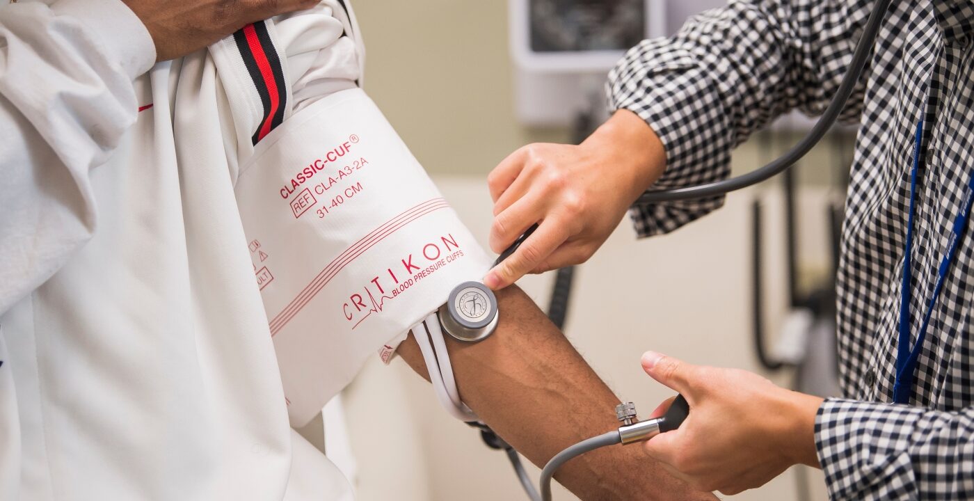 blood pressure reading on patient arm