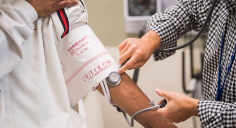 blood pressure reading on patient arm