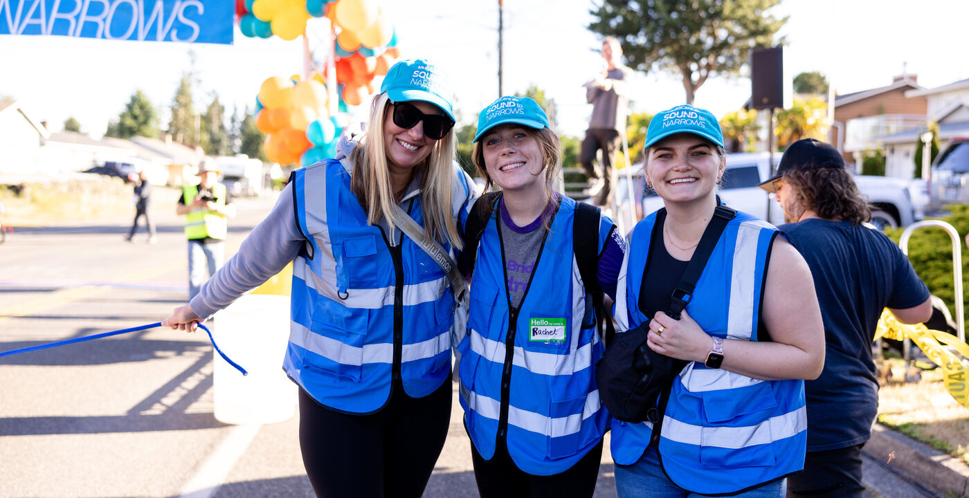 Group of Sound to Narrows volunteers in blue vests