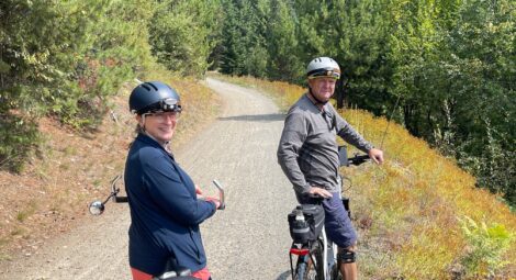 Man and woman on bike trail