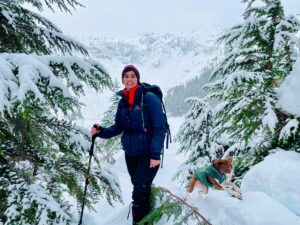 Woman hiking in snowy mountains