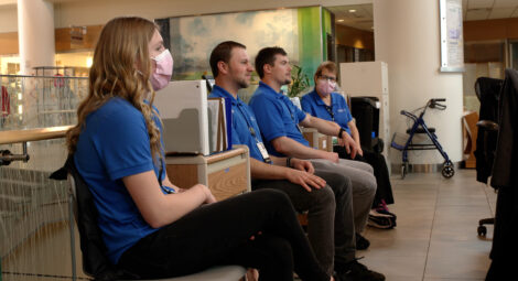 A group of people sitting.