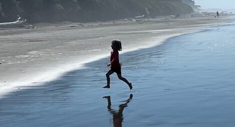 Child on a beach.