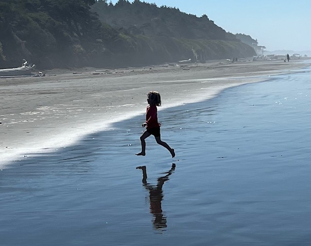 Child on a beach.