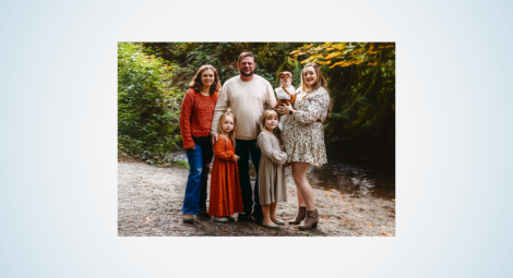 Family portrait in a wooded setting