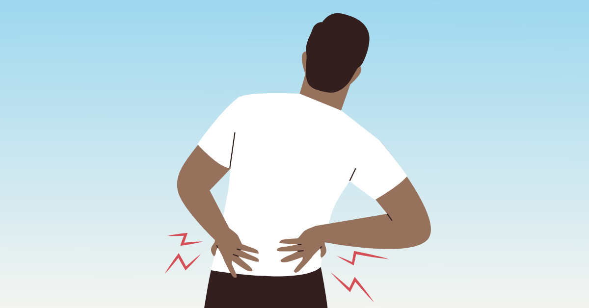 Man with hands on low back in pain