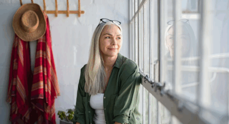 Woman looking out window
