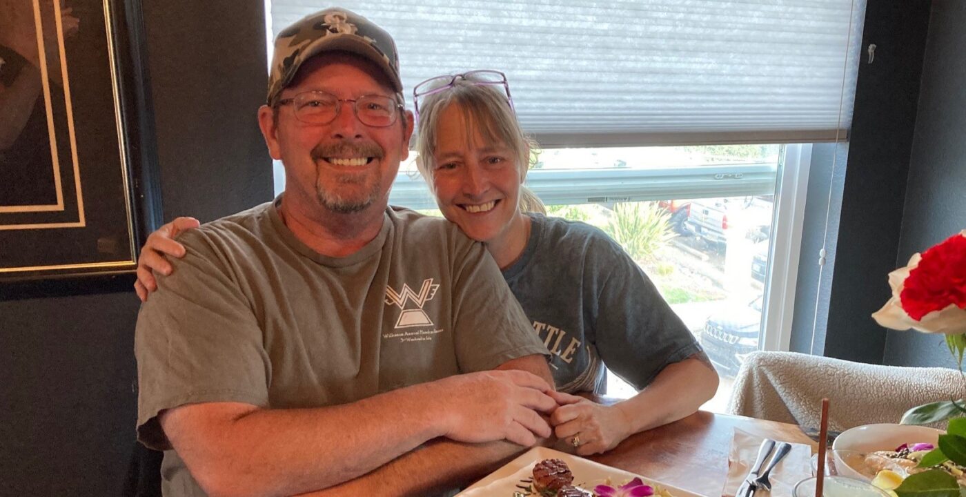 Man and woman at restaurant table