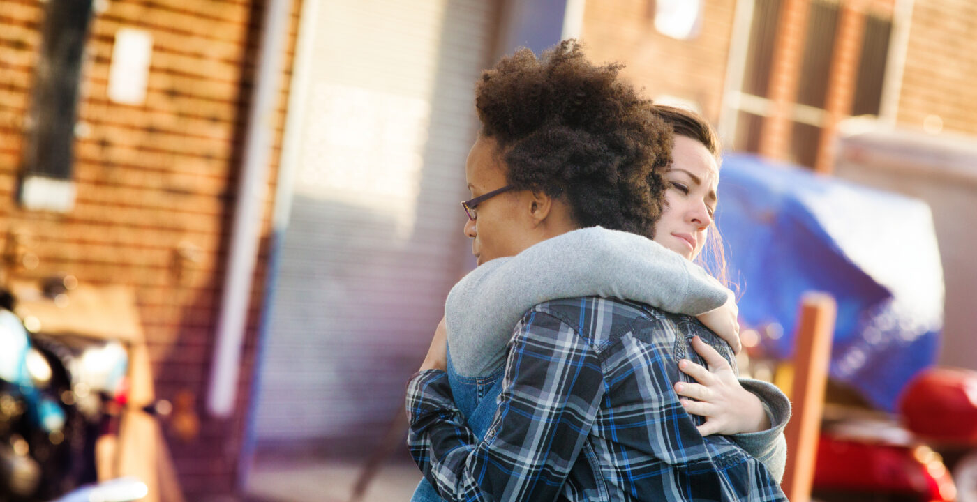 Two people hugging