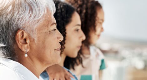 Side profiles of three women in a family