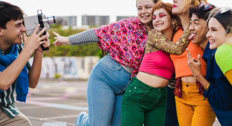 Group of teens pose for photo