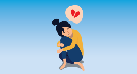 illustration of woman hugging legs to chest with broken heart above her