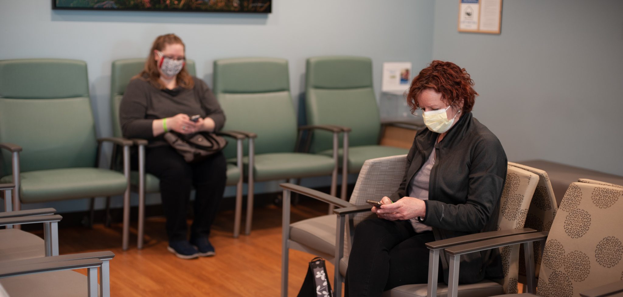 Masked patients in waiting room