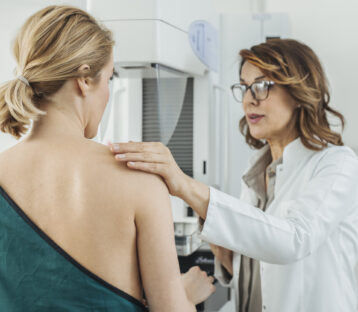 Woman Physician Talking With Her Mammogram Patient