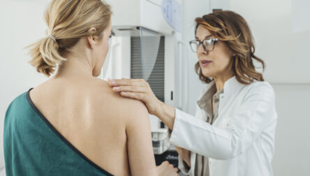 Woman Physician Talking With Her Mammogram Patient