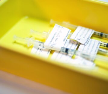 Vaccines in a yellow tub