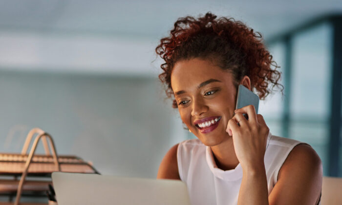 Woman on her mobile phone makes a call.
