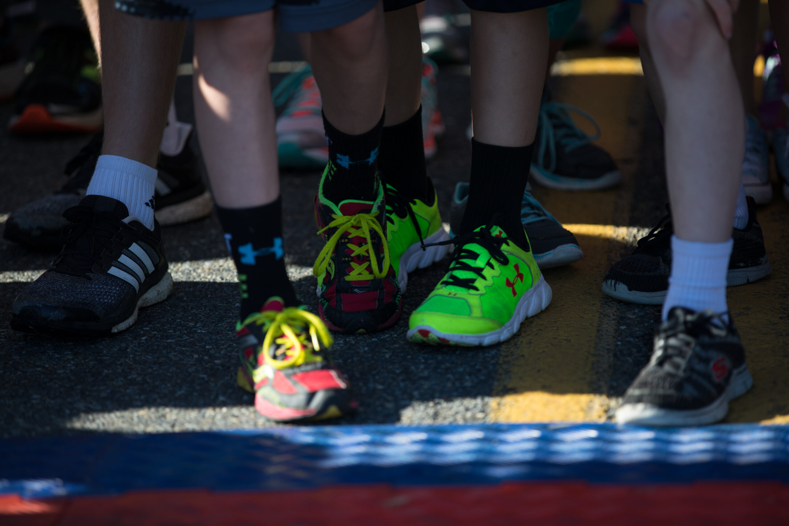 Participants at the starting line in sneakers