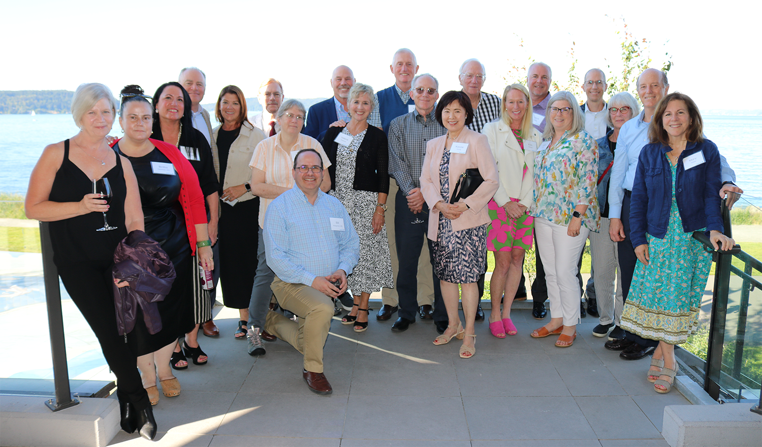 Capital Foundation Board of Directors poses for a photo on an outdoor patio